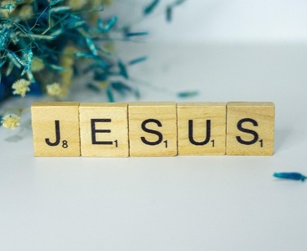 Scrabble tiles spelling Jesus
